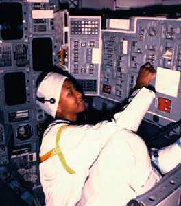 Jemison, Mae: performing a preflight switch test in the crew module of the space shuttle “Atlantis” [Credit: AP]