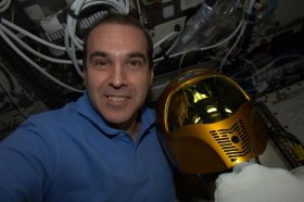 NASA astronaut Rick Mastracchio posted this selfie snapshot of himself and NASA's Robonaut 2 robot on the International Space Station while taking part in the