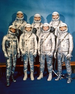 The National Aeronautics and Space Administration came into being on October 1, 1958. NASA announced the seven Project Mercury Astronauts on April 9, 1959, only six months later. They are: (front, l to r) Walter H. Schirra, Jr., Donald K. Slayton, John H. Glenn, Jr., and Scott Carpenter; (back, l to r) Alan B. Shepard, Jr., Virgil I. Gus Grissom, and L. Gordon Cooper.