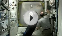 ISS astronauts carry out emergency spacewalk